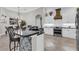 Modern kitchen features a patterned island, stainless steel appliances, and a gray countertop at 927 River Basin Ct # 201C, Bradenton, FL 34212