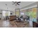 Open living space with large windows and access to the covered lanai, offering an indoor-outdoor lifestyle at 927 River Basin Ct # 201C, Bradenton, FL 34212