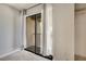 Bedroom view to balcony featuring light filtering curtains at 928 Sunridge Dr # F2, Sarasota, FL 34234