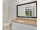 Bathroom features a large mirror, vanity, and is bright with natural light at 928 Sunridge Dr # F2, Sarasota, FL 34234