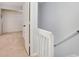 View of bedroom showing closet and a stairway at 928 Sunridge Dr # F2, Sarasota, FL 34234