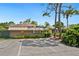 Exterior shot of the well-maintained Sunridge Clubhouse, a central hub for community activities at 928 Sunridge Dr # F2, Sarasota, FL 34234