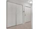 Entry hallway with closet and entrance doors, plus tiled floors at 928 Sunridge Dr # F2, Sarasota, FL 34234