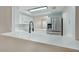 Well-lit kitchen featuring stainless steel refrigerator, white countertops and tile backsplash at 928 Sunridge Dr # F2, Sarasota, FL 34234
