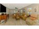 Cozy living room with a leather sectional couch and decor at 9321 New Martinsville Ave, Englewood, FL 34224