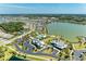 Overhead shot showcasing community lake, pool, and clubhouse at 1007 Waterline Ct, Sarasota, FL 34240