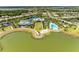 Community amenities with pool, clubhouse and lake at 1007 Waterline Ct, Sarasota, FL 34240