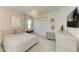Cozy bedroom with a comfortable bed, stylish nightstand, and bright natural light creating a peaceful retreat at 1007 Waterline Ct, Sarasota, FL 34240