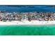 Breathtaking aerial view of beachfront community with turquoise waters and pristine sandy beach at 101 25Th N St # 1, Bradenton Beach, FL 34217