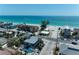 Stunning aerial view of beachside homes with turquoise ocean views on a clear, sunny day at 101 25Th N St # 1, Bradenton Beach, FL 34217