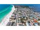 Stunning aerial view of a home near the beach with turquoise water, showcasing the ideal coastal living at 101 25Th N St # 1, Bradenton Beach, FL 34217