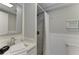 Elegant bathroom featuring a tiled shower, modern fixtures, and ample counter space at 101 25Th N St # 1, Bradenton Beach, FL 34217