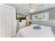 Cozy bedroom featuring a plush bed, natural light, and stylish coastal decor at 101 25Th N St # 1, Bradenton Beach, FL 34217