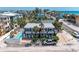 Charming beachfront home featuring a pool and tiki hut, perfect for relaxation and entertaining guests at 101 25Th N St # 1, Bradenton Beach, FL 34217