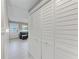 Hallway with closet doors leading to the living area, enhancing the home's flow at 101 25Th N St # 1, Bradenton Beach, FL 34217
