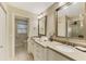 Bathroom features double sinks and plenty of storage at 1038 Contento St, Sarasota, FL 34242