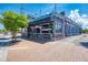 Charming, popular beach club featuring shaded outdoor seating and an awning at 1038 Contento St, Sarasota, FL 34242