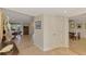Welcoming foyer with tile flooring, leading to living areas and dining room for seamless flow at 1038 Contento St, Sarasota, FL 34242
