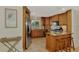 Well-equipped kitchen with stainless steel appliances, granite countertops, and wooden cabinetry at 1038 Contento St, Sarasota, FL 34242