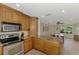 Spacious kitchen with granite countertop and stainless steel oven, microwave and appliances at 1038 Contento St, Sarasota, FL 34242