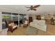 Open living room featuring comfortable seating, view of canal, and bright, inviting spaces at 1038 Contento St, Sarasota, FL 34242