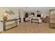 Bright living room with coastal accents, tile floors, and an open layout for easy living and entertaining at 1038 Contento St, Sarasota, FL 34242