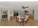 Inviting dining area leading to the kitchen and the living room, complete with tiled flooring at 1038 Contento St, Sarasota, FL 34242