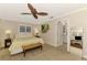 The bright main bedroom features neutral paint and natural light at 1038 Contento St, Sarasota, FL 34242