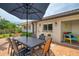 Outdoor dining area with patio and canal views for outdoor dining at 1038 Contento St, Sarasota, FL 34242