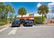 Exterior of Village Cafe offers parking and sidewalk seating, inviting customers to enjoy a meal in a casual atmosphere at 1038 Contento St, Sarasota, FL 34242