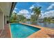 Inviting swimming pool offering picturesque water views and a serene outdoor oasis at 1038 Contento St, Sarasota, FL 34242
