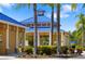 Community pavilion showcases a covered seating area and lush tropical landscaping for relaxation at 11634 Piedmont Park Xing, Bradenton, FL 34211