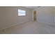 Spacious bedroom ready for renovation featuring a window for natural light and closet at 1223 De Narvaez Ave, Bradenton, FL 34209