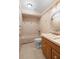 Cozy bathroom featuring a tub/shower combo, decorative tile accents, and a wood vanity with a decorative mirror at 1502 Water Oak S Way, Bradenton, FL 34209