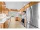 Modern kitchen equipped with stainless steel appliances and great storage space at 1502 Water Oak S Way, Bradenton, FL 34209