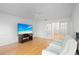 Cozy living room with a ceiling fan, and a TV for entertainment at 1502 Water Oak S Way, Bradenton, FL 34209