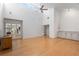 Spacious living room with vaulted ceilings, light wood floors, and ample natural light at 1502 Water Oak S Way, Bradenton, FL 34209