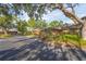 A neighborhood street view showcasing the architectural style of the homes at 1502 Water Oak S Way, Bradenton, FL 34209