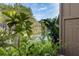 Scenic water view with tropical foliage and a clear sky at 1502 Water Oak S Way, Bradenton, FL 34209