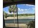 Enjoy golf course views from this screened-in balcony in a lush, tropical setting at 17118 Vardon Ter # 304, Bradenton, FL 34211
