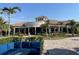 Elegant clubhouse exterior with manicured landscaping and comfortable outdoor seating at 17118 Vardon Ter # 304, Bradenton, FL 34211
