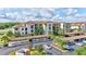 Beautiful condo building, landscaped parking, and golf course view at 17118 Vardon Ter # 304, Bradenton, FL 34211