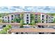 Beautiful condo building with lush landscaping and covered parking at 17118 Vardon Ter # 304, Bradenton, FL 34211