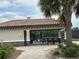 Tennis facilities with covered seating, benches and a supply and first aid station at 17118 Vardon Ter # 304, Bradenton, FL 34211