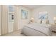 Cozy bedroom with neutral colors, natural light, and plush carpet flooring at 17142 James Trl, Parrish, FL 34219