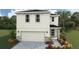 Charming two-story home with a two-car garage and stone accents at 1844 Cobb Trl, Parrish, FL 34219