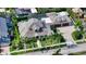 Expansive aerial view showcasing the property's layout, pool, and private backyard oasis surrounded by verdant landscaping at 1910 Datura St, Sarasota, FL 34239
