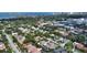 Sweeping aerial captures the home's idyllic neighborhood location near the bay and downtown at 1910 Datura St, Sarasota, FL 34239