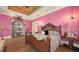Luxurious bedroom boasts a decorative ceiling, hardwood floors, and elegant furnishings at 1910 Datura St, Sarasota, FL 34239