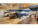 Large garage with a car lift, showcasing multiple vehicles and providing plenty of space for automotive work and storage at 1910 Datura St, Sarasota, FL 34239